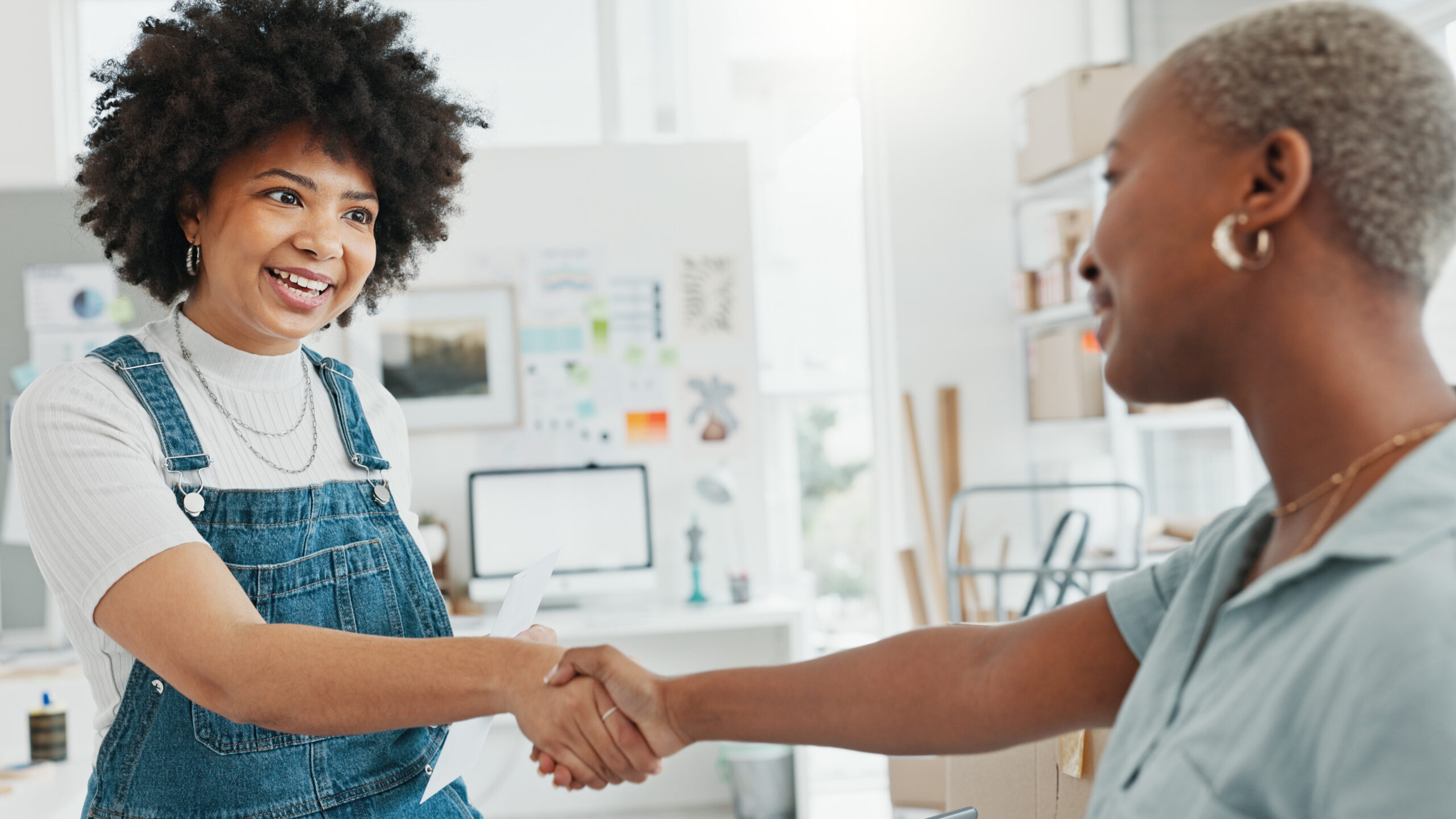 A friendly handshake between professionals, showcasing trust and connection in direct sales.